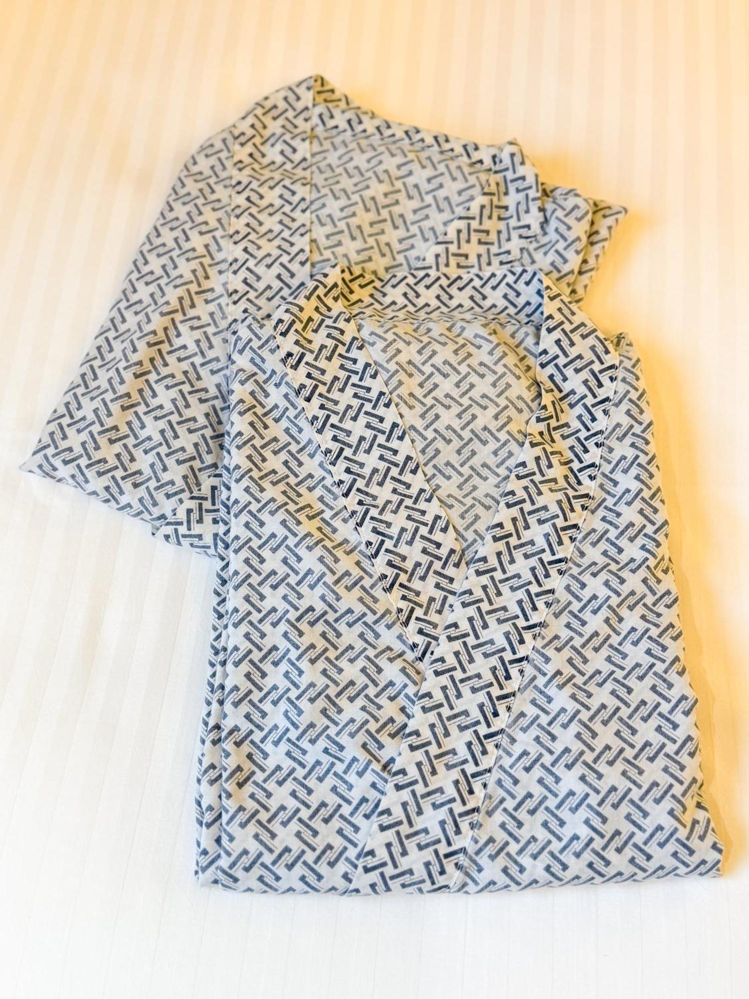 The Landis Taipei Hotel Exterior photo A shirt with a Greek key pattern